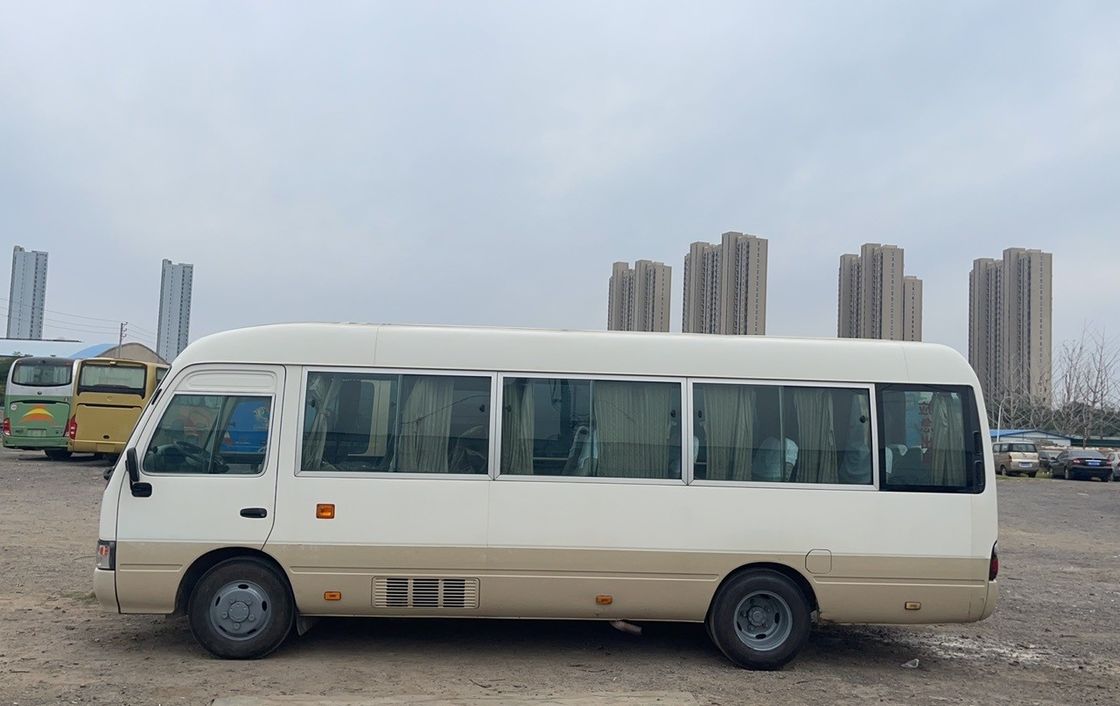 11Toeristische luxe bus 30 zitplaatsen Gebruikte diesel Toyota Coaster Bus voor toeristische bezienswaardigheden