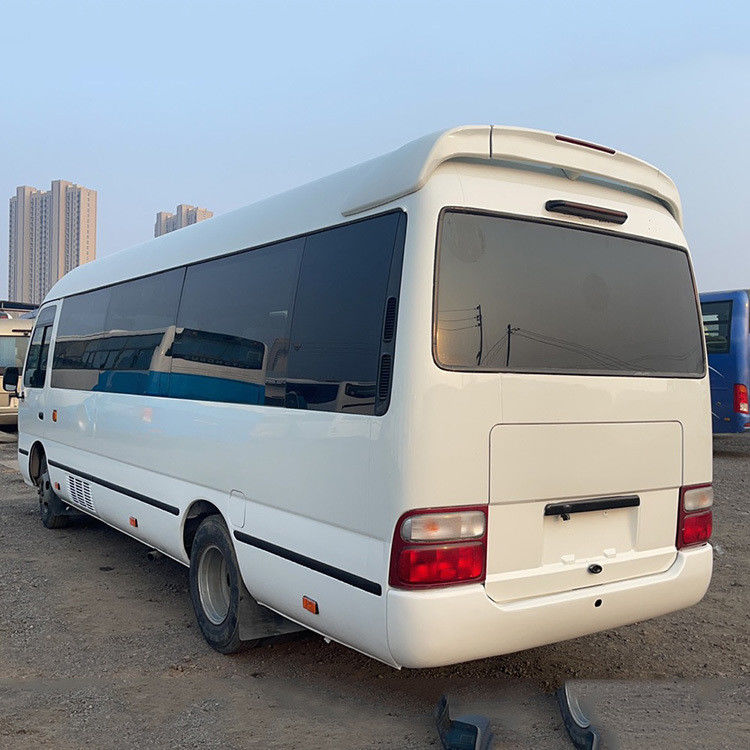 Gebruikte Toyota Coaster Bus LHD 30 zitplaatsen 7005*2040*2785mm voor klantvereiste