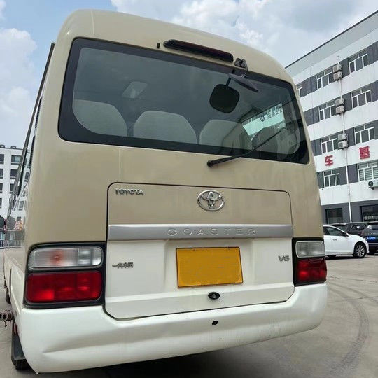 2023 Model Benzine Toyota Coaster Bus 30 zitplaatsen Motorcapaciteit 4L 7005*2040*2785mm