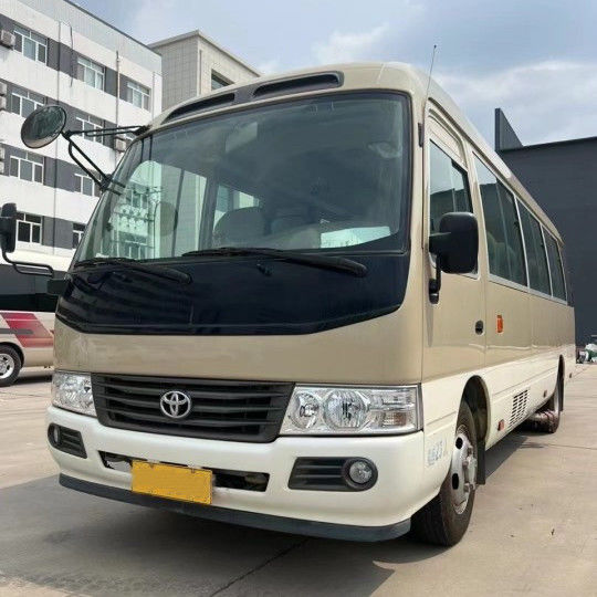 7005*2040*2785mm Toyota Coaster 30 plaatsen Minibus met een capaciteit van 17-30 zitplaatsen
