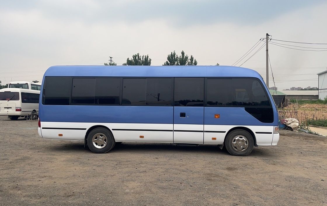 Euro 3 emissie standaard 25 zitplaatsen gebruikte Toyo Ta Coaster schoolbus hoge snelheid 69 Km/h