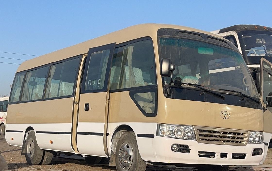 Japan Toyo ta Coaster 30 zitplaatsen LHD Bus met DF5S410 versnellingsbak en maximale snelheid 91 110 km/h