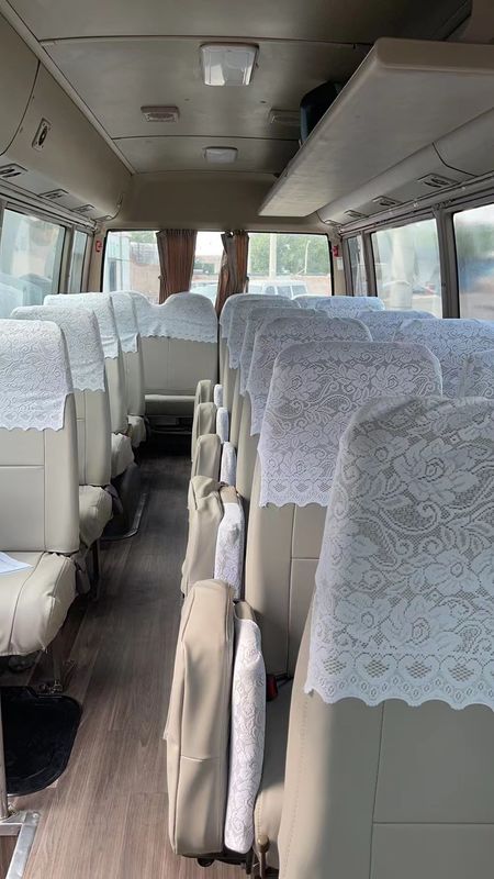 Handgestuurde 7m LHD tweedehands minibus 30 zitplaatsen