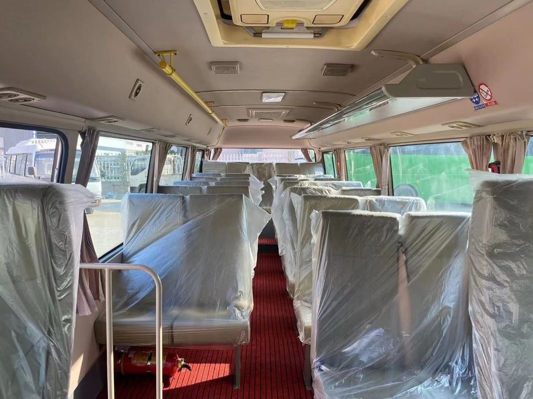 Toyo ta Coaster Bus met YC4FA130-30 motor en hoge snelheid in uitstekende staat