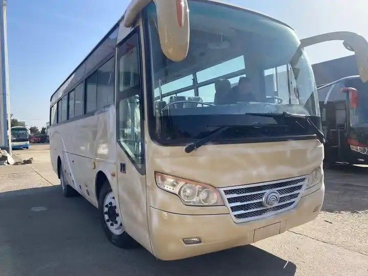 Leaf Spring Suspension 35 zitplaatsen Gebruikte busbus met stuurbekrachtiging en luxe stoelen