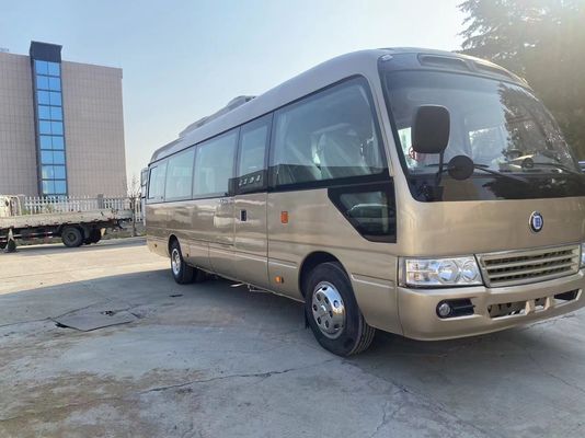 Toyota Coaster Bus met 30 passagiers en handgeschakelde transmissie