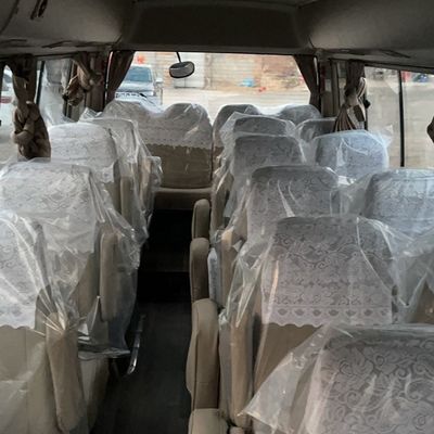 Goedkope gebruikte linksafrijdende Toyota Coaster Bus met optionele airconditioning