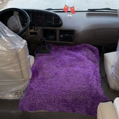 Goedkope gebruikte linksafrijdende Toyota Coaster Bus met optionele airconditioning